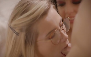 Carolina Sweets in a dirty threeway blowing a massive cock