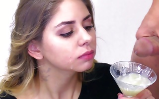 Julie Red drinking jizz from a martini glass